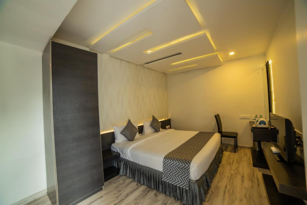 Poppys Tower Hotel Kojambuttúr Kültér fotó